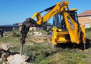 TLB - Backhoe Loader with Tok Tok Hammer Attachment