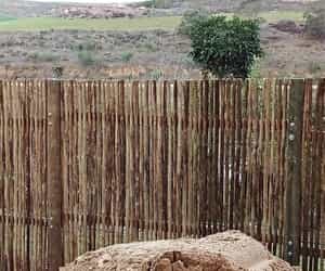 Sturdy Wooden Fence in Tesselaarsdal