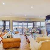 Lounge - Whale Waters Self Catering Lodge - Xplorio™ Gansbaai