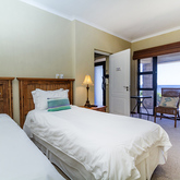 East Room - Whale Waters Self Catering Lodge - Xplorio™ Gansbaai