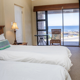 East Room - Whale Waters Self Catering Lodge - Xplorio™ Gansbaai