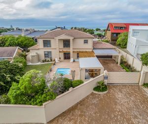 Coastal Luxury Living: Stunning 4 Bedroom Home with Pool and Study