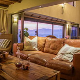 Lounge Area - Whale Huys Oceanfront Eco Villa - Xplorio™ Gansbaai