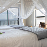 Bedroom 2 - Whale Huys Oceanfront Eco Villa - Xplorio™ Gansbaai