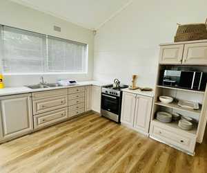 Old Tiles to Stylish Vinyl Upgrade!