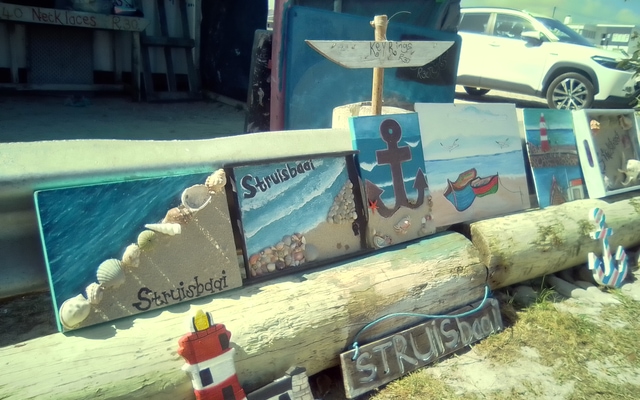 All hand made sea shells and painting buy us Deon and Jody 