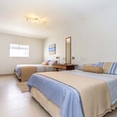 Stanford’s Cove Villa Downstairs Bedroom - Sea Rose Collection - Xplorio™ Gansbaai