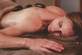 Melt Into Stillness with a Hot Stone Massage