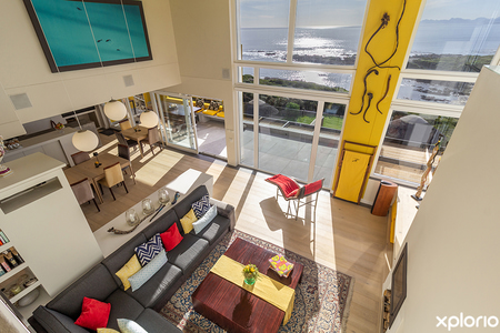 gansbaai_accommodation_crayfish_lodge_sea_and_country_guest_house_balcony_view_of_living_room_copy_1759820367