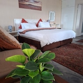 Bedroom - Saxon Lodge - Xplorio™ Gansbaai