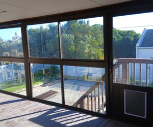 Stoep Enclosure Completed with Bronze Aluminium Elite Sliding Windows