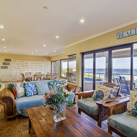 Lounge Area - Whale Waters Self Catering Lodge - Xplorio™ Gansbaai