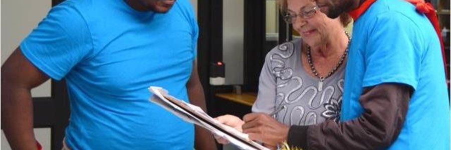 Executive Mayor Nicolette Botha-Guthrie (centre) receiving a “Memorandum of Awareness and Support” petition  from Siyabonga Vonco (right) and Mziwamakhosi Yiko-Skosana (left) of The Hermanus Rainbow Trust community development organisation. 