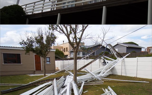  Die voorkant van die woning waar die afdak was. Gedeeltes van die afdak nadat dit oor die huis na die agterplaas deur die stormwing geslinger is.  
