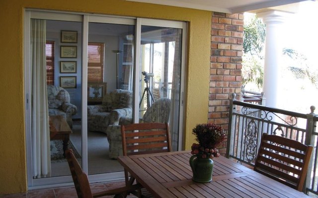 Upstairs Covered Stoep with sea views