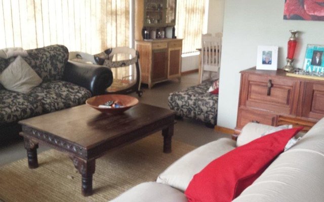 Lounge with walkthrough to dining room