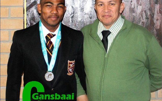 Marco Maarman saam met sy onderwyser, mnr Gillion.