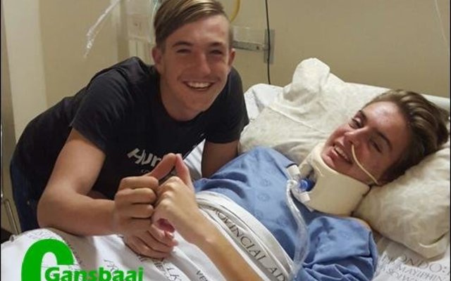 Calvin Olivier is flanked by his friend Ruben Rutzen