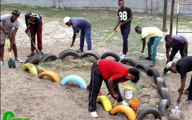 A team from Grootbos Foundation’s Food Security project busy to beautify  Strandlopertjie for their  television appearance this week.  In front is Anchelle Damon, from the Grootbos Early Chilhood Development Programme, with - from left:  Pontsho Chiloane, Vuyo Khonkco, Olwethu Sikhotshi, Lindile Xabenolini, Odwa Khutshwa, Zuko Mlonyeni and Luyanda Pinikiso. 