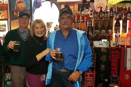 Banie van den Berg (right) was one of the privileged guests  at David Macdonald’s (left) private rugby museum.  They enjoy one of the many rare craft beers which was served by the host.  David’s wife, Margaret served a splendid five course meal in their cosy, historical dining room.