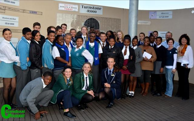 The Overstrand Junior Town Council recently visited the South African Penguin and Seabird Sanctuary in Gansbaai as part of the second leg of their annual orientation tour of facilities and municipal infrastructure. Seen with the group are Overstrand Councillor, Riana de Coning (back row, right) and Gansbaai Administration’s Area Manager, Francois Myburgh (back row, second right) and Brenda du Toit (middle row, right) of Dyer Island Conservation Trust. 