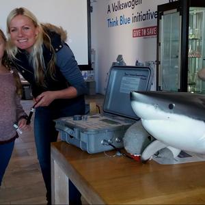 Nicole Schutte with shark biologist, Alison Towner, showing the DEEP students the equipment used in tagging and tracking white sharks.