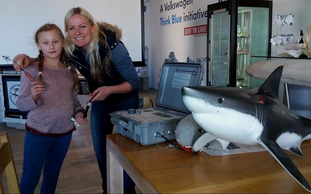 Nicole Schutte with shark biologist, Alison Towner, showing the DEEP students the equipment used in tagging and tracking white sharks. Nicole Schutte with shark biologist, Alison Towner, showing the DEEP students the equipment used in tagging and tracking white sharks.