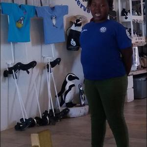 Aphelele Jordaan, standing proudly in the African Penguin & Seabird Sanctuary in Kleinbaai., is a 2nd year DEEP student.