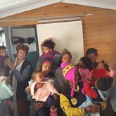 Rainbow Kids receive clothing donated by the public