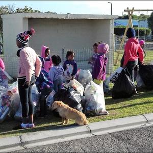 Eluxolweni children next to Pearly Beach brought their recyclable materials which they collected to the first swop shop in Eluxolweni where they exchanged it for tokens to buy needed items.