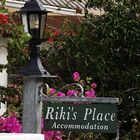 At Rikis Place Sign