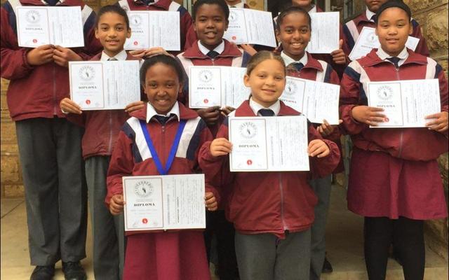 The  Marimba band of Okkie Smuts Primary School recently won the Overberg Eistedfodd primary school section with 95% (Cum Laude). Back from left: Damian van Heerden, Jade Coetzee, Kia McKay, Nicole Dreyer and Nahum Plaatjies.  Middle: Erin Dreyer, Busisiwe Mhlontlo, Kelsey Montagu and Sade October.  Front: Miché Damon and Kim McKay.