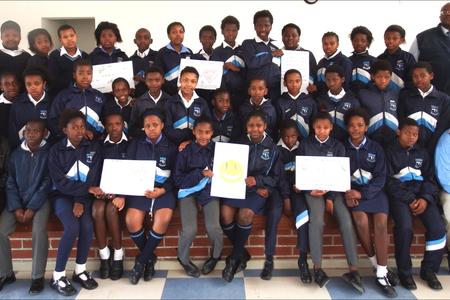 The prefects of Masakhane Primary School recently attended a  workshop weekend  at Wolwegat.For them it was not just a leadership course, but also a wake up call towards planning their future.  The message they took home afterwards was  to be strong, hopeful, proud, responsible and brave.  The privileged group who gained a lot of self confidence are here with their teachers Ms Chewa (front left)  and far right Mr Arosi. At the back on the right is Mr Mciteka, the Deputy Principal. The workshop was sponsored by the Football Foundation and facilitated by Natasha Breedenkamp and Shareen van der Merwe.