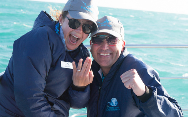 engagement on slash fin boat. marine dynamics, secret wedding