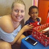 Mickyla Groenewald en vriende het vir die kinders by Rainbow kids beferf met kos en geskenkies.