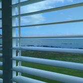 A clear view on the ocean while feeling safe with Taylor Security ShutterGuard