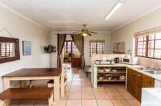 Gansbaai_town_lodge_open_plan_kitchen_lounge_1519909060