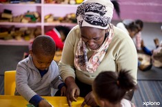 Food_4_thought_teacher_helping_children_2__1525936480