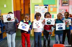 Food_4_thought_children_showing_off_their_paintings_1525936505