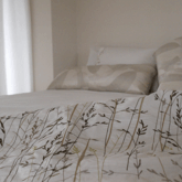 Relax in tranquil luxury with signature linens on the king-sized bed in the large master suite. 