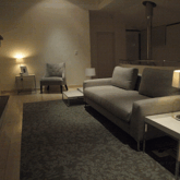 The upstairs lounge is the perfect location for relaxing in the evening -- with the wood-burning fireplace, sunset deck and balcony, and views across Walker Bay