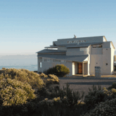 A view from the rear -- the front door opens to a breathtaking view of the bay