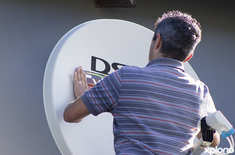 pringle_bay_home_television_dstv_tv_tronix_applying_sticker_1534513667