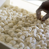 Gnocci being hand packed