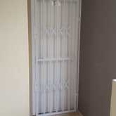 Retractable security gates