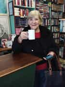 Client Having a Cup of Tea in her Favourite Bookshop