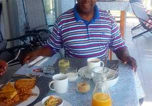 Guests Enjoying Breakfast at Amazing Grace B&B