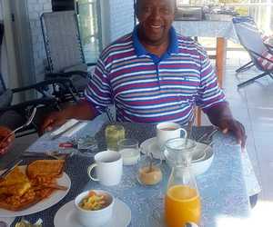 Guests Enjoying Breakfast at Amazing Grace B&B