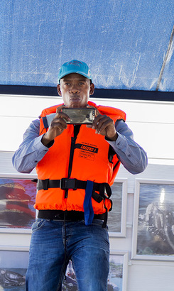 hermanus_things_to_do_whale_watching_hermanus_whale_cruises_demonstration_on_how_to_stand_on_ship_1567406403