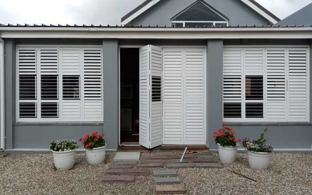 LOUVRE SECURITY SHUTTERS BY DEFENDoor®